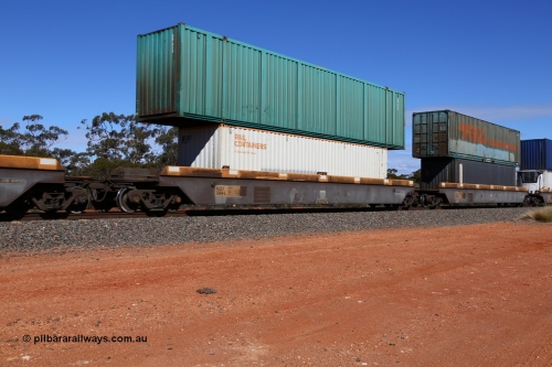 160528 8434
Binduli, intermodal train 6PM6, RQZY 7064 platform 2 of five unit bar coupled well container waggon set built in a batch of thirty two by Goninan NSW in 1995/96, loaded with Rail Containers 40' 4EG1 type container SCFU 412304[7] double stacked with a 53' car container AB 059.
Keywords: RQZY-type;RQZY7064;Goninan-NSW;