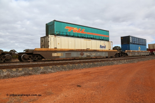 160529 8767
Parkeston, 6MP4 intermodal train, RRZY 7049 platform 1 of 5-pack well waggon set, one of thirty two sets built by Goninan NSW in 1995-96 for National Rail as RQZY type, recoded to RRZY when repaired, notice difference between this waggon and the one in front which is in original condition, loaded with a Rand 46' 6