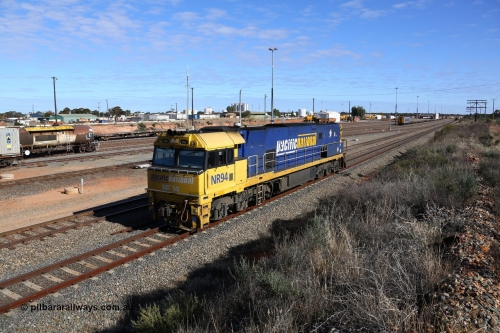 160531 9881
West Kalgoorlie, Pacific National's Goninan built GE model Cv40-9i NR class unit NR 94 serial 7250-06/97-300, shunts off 3PM4 steel train to collect the loading and crew coach sitting in the yard. 31st of May 2016.
Keywords: NR-class;NR94;Goninan;GE;Cv40-9i;7250-06/97-300;