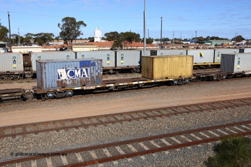 160531 9896
West Kalgoorlie, 1MP2 steel train, container waggon RQGY 34489, one of a hundred built by Tulloch Ltd NSW as OCY type, recoded to NQOY, loaded with a CMA 20' box ECMU 108818 and 20' box RSSU 139744.
Keywords: RQGY-type;RQGY34489;Tulloch-Ltd-NSW;OCY-type;NQOY-type;