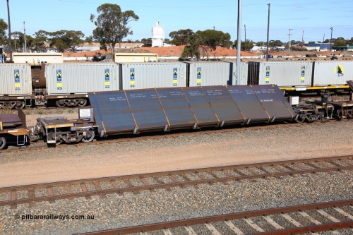 160531 9924
West Kalgoorlie, 1MP2 steel train, RKYY type wide steel plate tilt waggon RKYY 7105, one of twenty seven units built by AN Rail Islington Workshops in 1995-96. Loaded with steel plate.
Keywords: RKYY-type;RKYY7105;AN-Islington-WS;