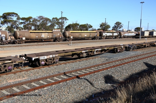 160531 9952
West Kalgoorlie, 3PM4 steel train, empty RQFY 98 container waggon, built by Victorian Railways Bendigo Workshops in 1980 as a batch of seventy five VQFX type skeletal container waggons, recoded to VQFY c1985, then RQFY May 1994, May 1995 to RQFF, then 2CM bogies fitted in Aug 1995 and current code Jan 1997.
Keywords: RQFY-type;RQFY98;Victorian-Railways-Bendigo-WS;VQFX-type;