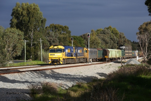160609 0386
Woodbridge, 5PM5 intermodal train arrives at the triangle and splits signal post 82 and 84 with power from Goninan built GE model Cv40-9i NR class unit NR 35 serial 7250-06/97-237 and a sister unit with 39 waggons for a length of 1791 metres and 3960 tonnes.
Keywords: NR-class;NR35;Goninan;GE;Cv40-9i;7250-06/97-237;