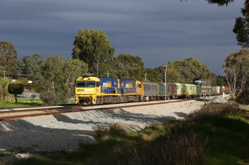 160609 0387
Woodbridge, 5PM5 intermodal train arrives at the triangle and splits signal post 82 and 84 with power from Goninan built GE model Cv40-9i NR class unit NR 35 serial 7250-06/97-237 and a sister unit with 39 waggons for a length of 1791 metres and 3960 tonnes.
Keywords: NR-class;NR35;Goninan;GE;Cv40-9i;7250-06/97-237;