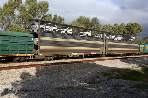 160609 0399
Woodbridge, 5PM5 intermodal train, articulated 2-pack triple deck automobile waggon RMEY 2419, converted by Cheeseman Engineering in 2004 from a former 1971 vintage AE Goodwin built GNX automobile waggon ANMX 2419 and another ANMX waggon.
Keywords: RMEY-type;RMEY2419;Cheeseman-Engineering-SA;AE-Goodwin;GNX-type;AMNX-type;