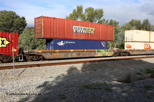 160609 0439
Woodbridge, 5PM5 intermodal train, RQZY 7065 platform 1 of 5-pack well waggon set one of thirty two waggon sets built by Goninan NSW for National Rail in 1995-96, double stacked with a Patrick 53' automobile box A 038 and a Cronos 40' 4EG1 type box CXSU 123707[0].
Keywords: RQZY-type;RQZY7065;Goninan-NSW;