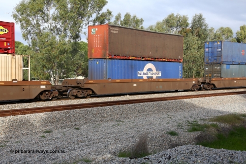 160609 0479
Woodbridge, 5PM5 intermodal train, platform 2 of 5-pack RRRY 7012 well waggon set, one of nineteen built in China at Zhuzhou Rolling Stock Works for Goninan in 2005, double stacked with a K+S Freighters 40' curtainsider ISKU 400650 and a 40' 4FG9 type Railroad Transport box RRTU 004082[0].
Keywords: RRRY-type;RRRY7012;CSR-Zhuzhou-Rolling-Stock-Works-China;