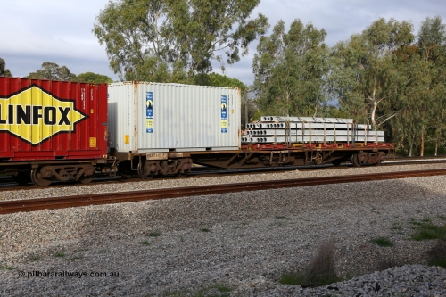 160609 0486
Woodbridge, 5PM5 intermodal train, RQFY 113 container waggon, built by Victorian Railways Bendigo Workshops in 1980 as a batch of seventy five VQFX type skeletal container waggons, to VQFY in 1989, current code in 1995 when 2CM bogies fitted, loaded with a 20' 25G1 type Royal Wolf box RWPU 201456[0] and a K&S Transport 40' flatrack KT 140 with concrete forms.
Keywords: RQFY-type;RQFY113;Victorian-Railways-Bendigo-WS;VQFX-type;