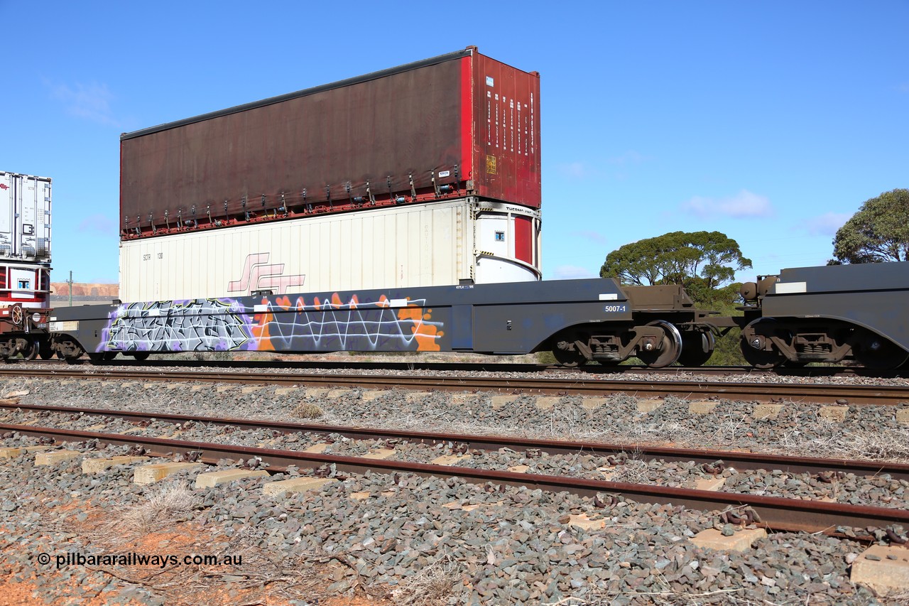 160522 2202
Parkeston, SCT train 6MP9 operating from Melbourne to Perth, CFCLA lease CQWY type well waggon set CQWY 5007-1 with a SCT 40' reefer SCTR 130 and RWTU 903034 40' curtain sider on top. The CQWY was built by Bluebird Rail Operations in South Australia in 2008 as a batch of sixty pairs.
Keywords: CQWY-type;CQWY5007;CFCLA;Bluebird-Rail-Operations-SA;