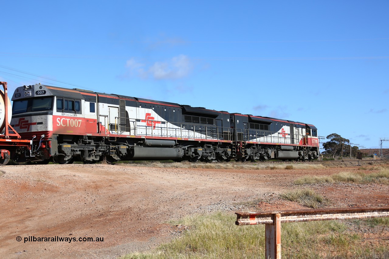 160522 2219
Parkeston, SCT train 6MP9 operating from Melbourne to Perth departs for West Kalgoorlie and eventually Perth behind EDI Downer built EMD model GT46C-ACe unit SCT 007 'Geoff (James Bond) Smith' serial 97-1731 with 76 vehicles for 5382 tonnes and 1800 metres length.
Keywords: SCT-class;SCT007;07-1731;EDI-Downer;EMD;GT46C-ACe;