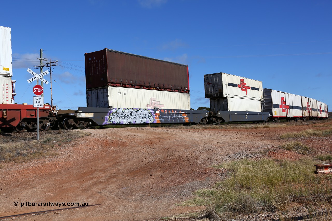 160522 2228
Parkeston, SCT train 6MP9 operating from Melbourne to Perth, CQWY type CQWY 5007-1 with a SCT 40' reefer SCTR 130 and RWTU 903034 40' curtain sider on top. The CQWY was built by Bluebird Rail Operations in South Australia in 2008 as a batch of sixty pairs.
Keywords: CQWY-type;CQWY5007;CFCLA;Bluebird-Rail-Operations-SA;