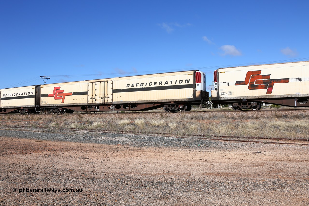 160522 2260
Parkeston, SCT train 6MP9 operating from Melbourne to Perth, ARFY type ARFY 2389 refrigerated van with a Ballarat built Maxi-CUBE body mounted on an original Commonwealth Railways ROX container waggon built by Perry Engineering SA in 1971, recoded to AQOX, AQOY and RQOY before having the Maxi-CUBE refrigerated body added circa 1998 for SCT service.
Keywords: ARFY-type;ARFY2389;Maxi-Cube;Perry-Engineering-SA;ROX-type;AQOX-type;