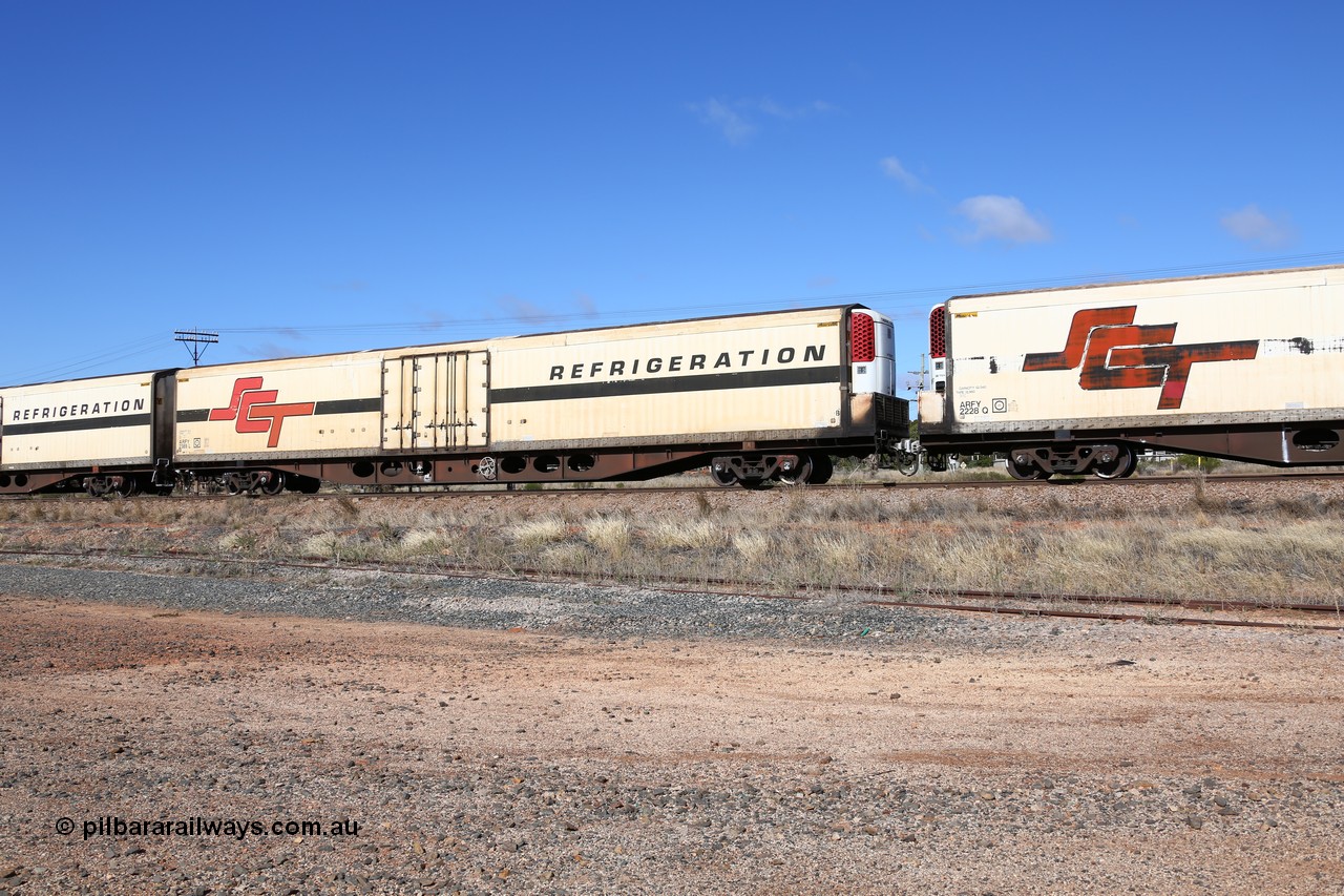 160522 2260
Parkeston, SCT train 6MP9 operating from Melbourne to Perth, ARFY type ARFY 2389 refrigerated van with a Ballarat built Maxi-CUBE body mounted on an original Commonwealth Railways ROX container waggon built by Perry Engineering SA in 1971, recoded to AQOX, AQOY and RQOY before having the Maxi-CUBE refrigerated body added circa 1998 for SCT service.
Keywords: ARFY-type;ARFY2389;Maxi-Cube;Perry-Engineering-SA;ROX-type;AQOX-type;