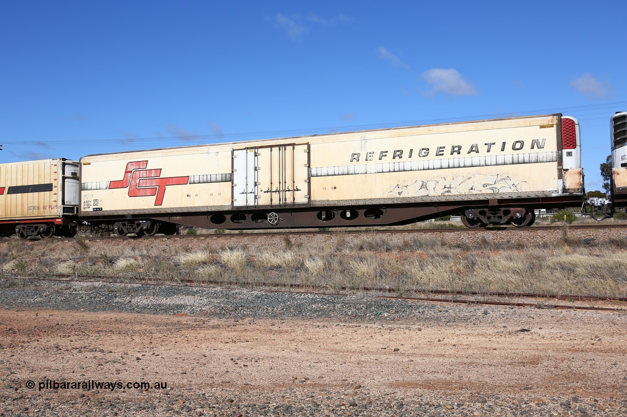 160522 2262
Parkeston, SCT train 6MP9 operating from Melbourne to Perth, ARFY type ARFY 2188 refrigerated van with a Ballarat built Maxi-CUBE body mounted on an original Commonwealth Railways ROX container waggon built by Comeng Qld in 1970, recoded to AQOX, AQOY and RQOY before having the Maxi-CUBE refrigerated body added circa 1998 for SCT service.
Keywords: ARFY-type;ARFY2188;Maxi-Cube;Comeng-Qld;ROX-type;AQOX-type;