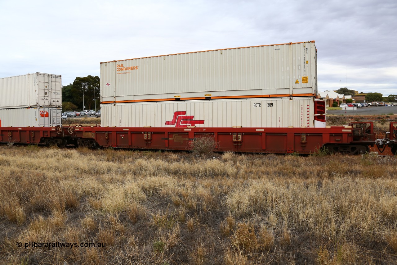 160524 3663
Kalgoorlie, SCT train 2PM9 operating from Perth to Melbourne, PWWY type PWWY 0010 one of forty well waggons built by Bradken NSW for SCT, loaded with an SCT 48' reefer SCTR 309 and a 48' MFG1 box Rail Containers SCFU 412599.
Keywords: PWWY-type;PWWY0010;Bradken-NSW;