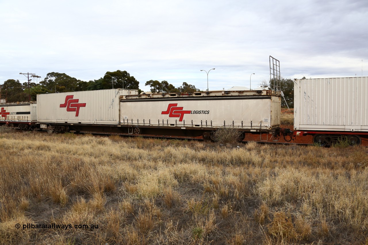 160524 3669
Kalgoorlie, SCT train 2PM9 operating from Perth to Melbourne, CQMY type 80' container flat CQMY 3017, a CFCLA lease waggon built by Bluebird Rail Operations in a group of one hundred loaded with a 40' half height SCT curtainsider and a former Macfield 40' flatrack on top MGCU 660941 and a 40' SCT box SCT 40212.
Keywords: CQMY-type;CQMY3017;Bluebird-Rail-Operations-SA;