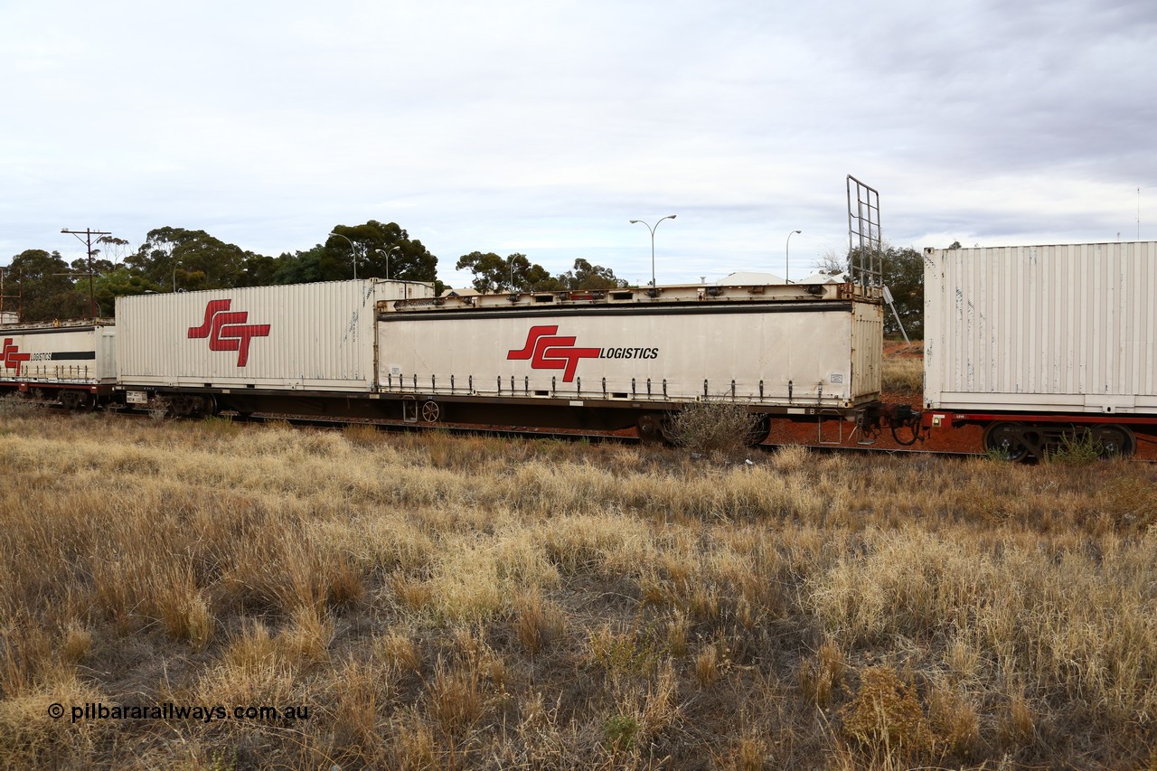 160524 3669
Kalgoorlie, SCT train 2PM9 operating from Perth to Melbourne, CQMY type 80' container flat CQMY 3017, a CFCLA lease waggon built by Bluebird Rail Operations in a group of one hundred loaded with a 40' half height SCT curtainsider and a former Macfield 40' flatrack on top MGCU 660941 and a 40' SCT box SCT 40212.
Keywords: CQMY-type;CQMY3017;Bluebird-Rail-Operations-SA;