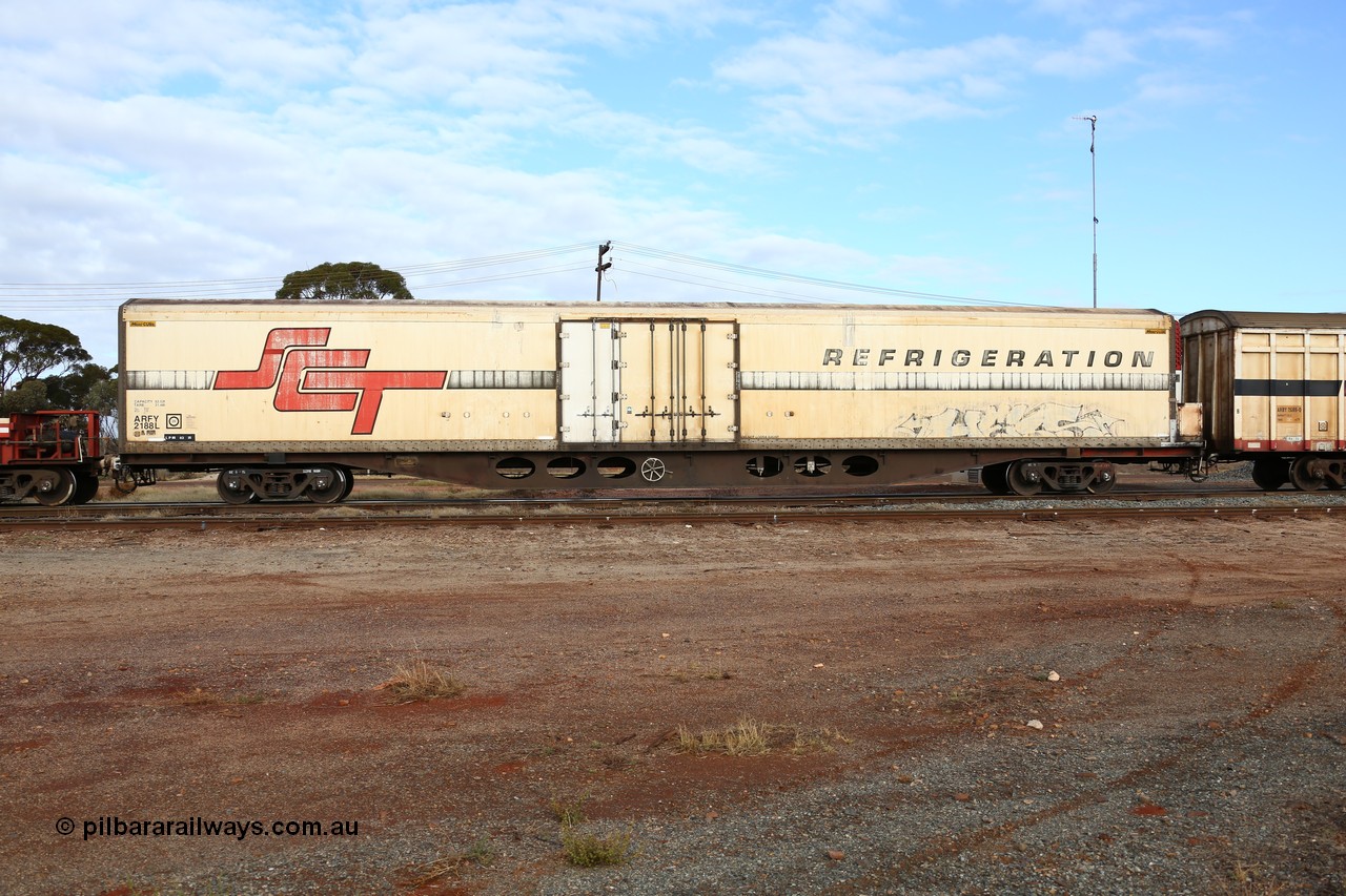 160525 4575
Parkeston, SCT train 3PG1 which operates from Perth to Parkes NSW (Goobang Junction), ARFY type ARFY 2188 refrigerated van with a Ballarat built Maxi-CUBE body mounted on an original Commonwealth Railways ROX container waggon built by Comeng Qld in 1970, recoded to AQOX, AQOY and RQOY before having the Maxi-CUBE refrigerated body added circa 1998 for SCT service.
Keywords: ARFY-type;ARFY2188;Maxi-Cube;Comeng-Qld;ROX-type;AQOX-type;