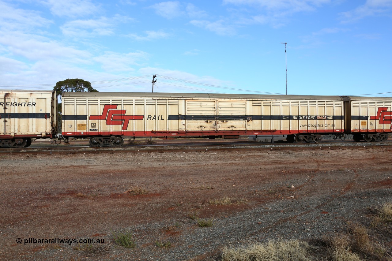 160525 4627
Parkeston, SCT train 3PG1 which operates from Perth to Parkes NSW (Goobang Junction), ABSY type ABSY 2454 covered van, originally built by Mechanical Handling Ltd SA in 1971 for Commonwealth Railways as VFX type recoded to ABFX and then RBFX to SCT as ABFY before being converted by Gemco WA to ABSY type in 2004/05.
Keywords: ABSY-type;ABSY2454;Mechanical-Handling-Ltd-SA;VFX-type;ABFY-type;