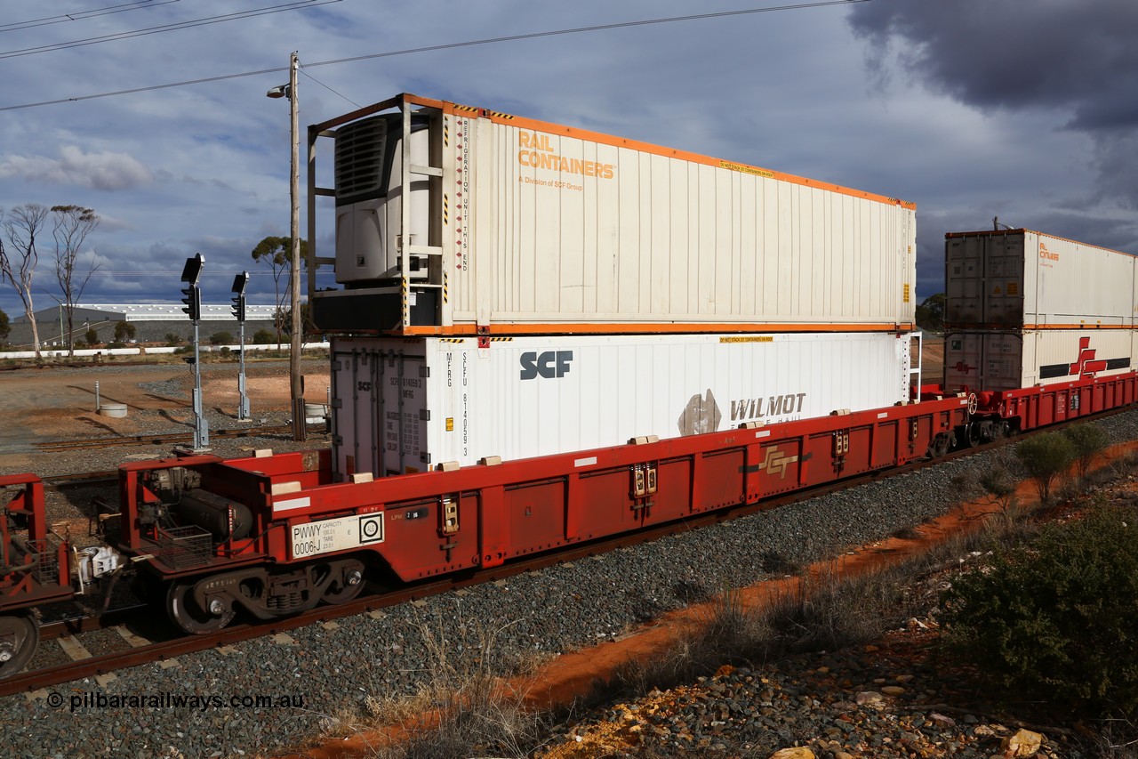 160526 5306
West Kalgoorlie, SCT train 3MP9 operating from Melbourne to Perth, PWWY type PWWY 0006 one of forty well waggons built by Bradken NSW for SCT, loaded with two 48' reefers, MFRG type former Wilmot Freeze Haul now SCF reefer SCFU 814059 and MFR3 type Rail Containers SCFU 811018.
Keywords: PWWY-type;PWWY0006;Bradken-NSW;