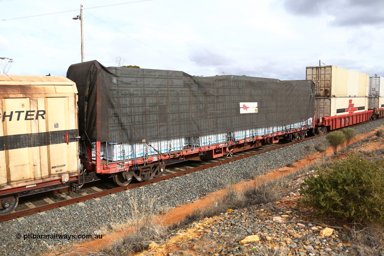 160526 5334
West Kalgoorlie, SCT train 3MP9 operating from Melbourne to Perth, originally built by Victorian Railways Newport Workshops in 1969 as one of four hundred and fifty five FQX type 60' 3TEU container flat waggons built over ten years, it managed to be recoded several times carrying FQF - VQCX - VQCY - VQCX - RQCX before private ownership and reclassed PQCY type, PQCY 564 is now fitted with bulkheads and here loaded with timber products.
Keywords: PQCY-type;PQCY564;Victorian-Railways-Newport-WS;FQX-type;VQCX-type;