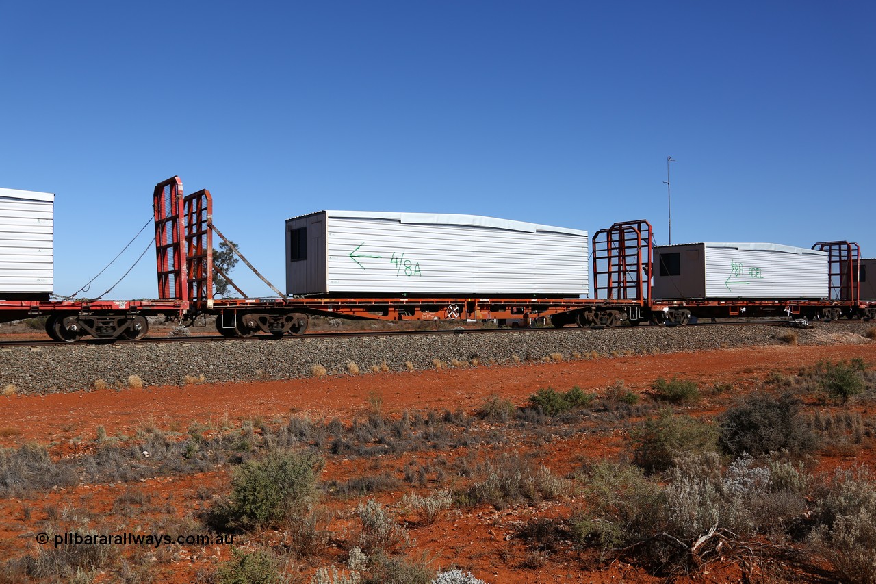 160527 5539
Blamey crossing loop at the 1692 km, SCT train 5PM9 operating from Perth to Melbourne, originally one of fifty RMX type container flat waggons built 1975-76 by Carmor Engineering SA, recoded through life to AQMX, AQMY and RQMY, seen here coded as PQTY type for SCT service as PQTY 3045 and fitted with bulkheads and loaded portable building.
Keywords: PQTY-type;PQTY3045;Carmor-Engineering-SA;RMX-type;