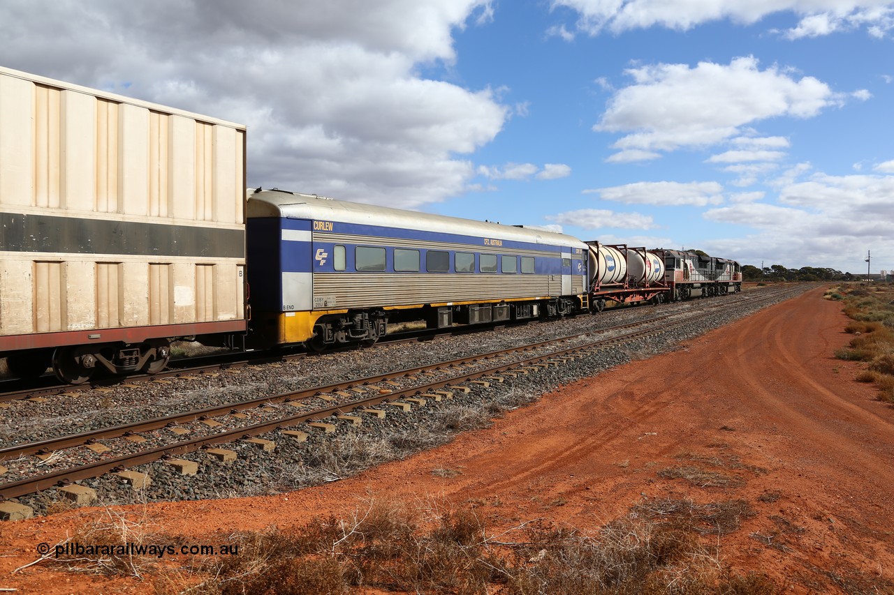 160529 8875
Parkeston, SCT train 6MP9 operating from Melbourne to Perth, CFCLA leased crew accommodation coach CDBY type CDBY 255 'Curlew', originally built by SAR Islington Workshops in 1956 as a Bluebird railcar 'Curlew', later numbered 802 in National Rail service, then to CDBY 255 when converted to crew coach in 2007 behind SCT class units SCT 010 and SCT 007 with inline refuelling waggon PQFY 4209.
Keywords: CDBY-class;CDBY255;SAR-Islington-WS;Bluebird;250-class;