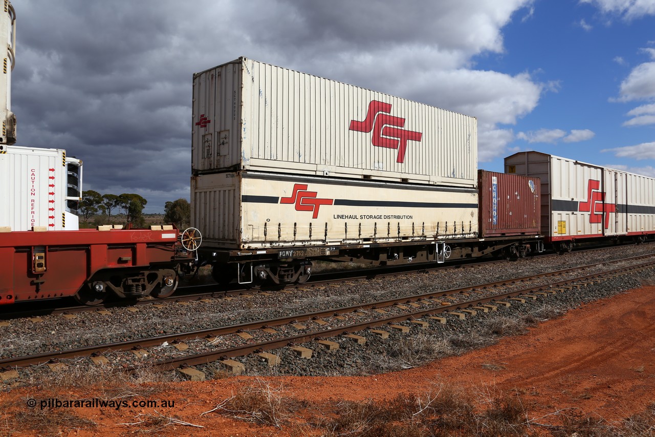 160529 8883
Parkeston, SCT train 6MP9 operating from Melbourne to Perth, PQMY type 60' 3TEU container flat waggon PQMY 2752 originally built by Perry Engineering SA in 1974 as an RMX type flat, recoded through AQMX - AQMY - RQMY types before SCT ownership, loaded with a 40' half height SCT curtainsider SCT 1006, SCT 40' box SCT 40205 and a 20' 2EG1 Cronos box BSTG 077678.
Keywords: PQMY-type;PQMY2752;Perry-Engineering-SA;RMX-type;