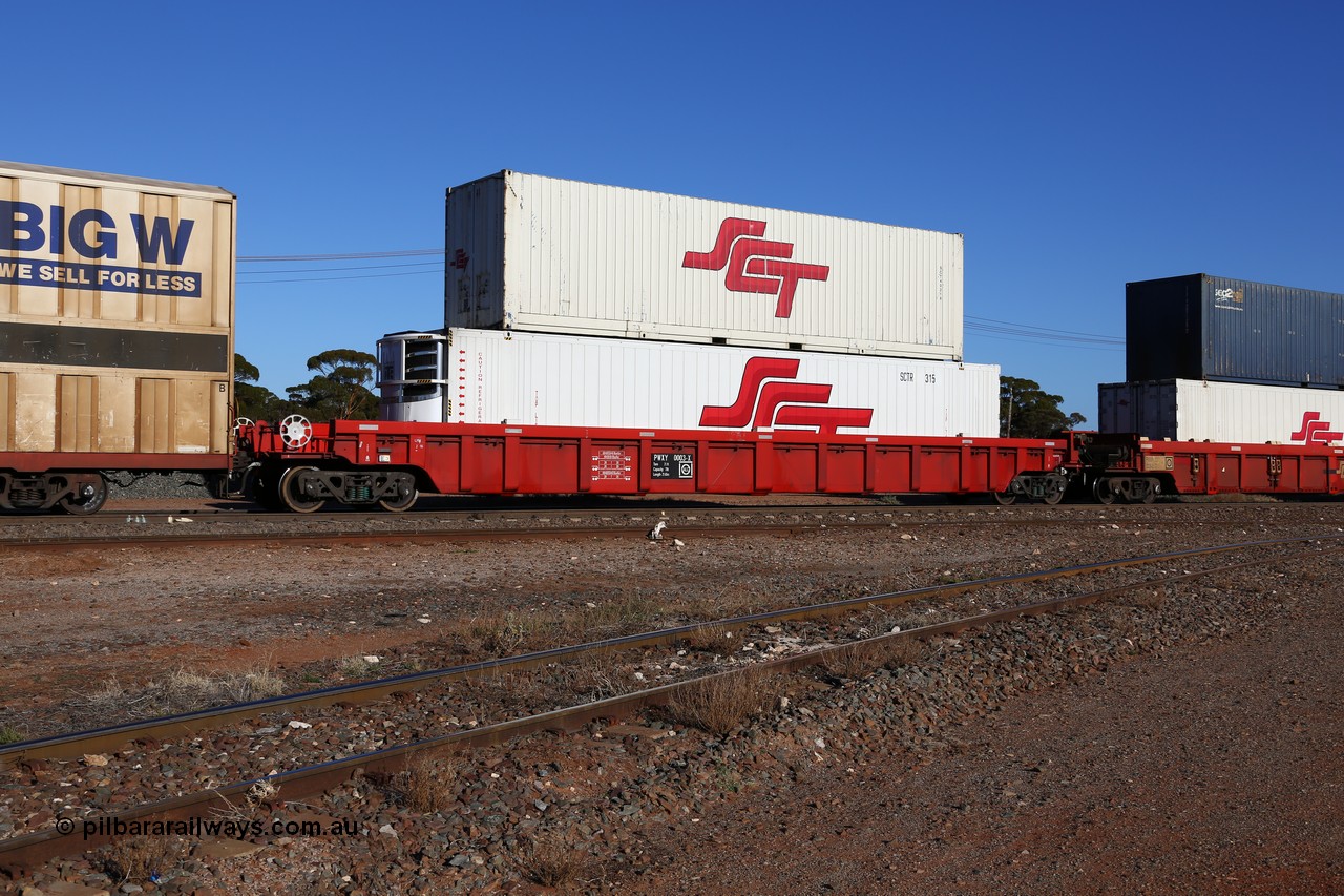 160530 9108
Parkeston, SCT train 1PM9 operates mostly empty from Perth to Melbourne, PWXY type PWXY 0003 one of twelve well waggons built by CSR Meishan Rolling Stock Co of China for SCT in 2008, loaded with a 48' SCT reefer SCTR 315 and a 40' SCT box SCT 40218.
Keywords: PWXY-type;PWXY0003;CSR-Meishan-China;