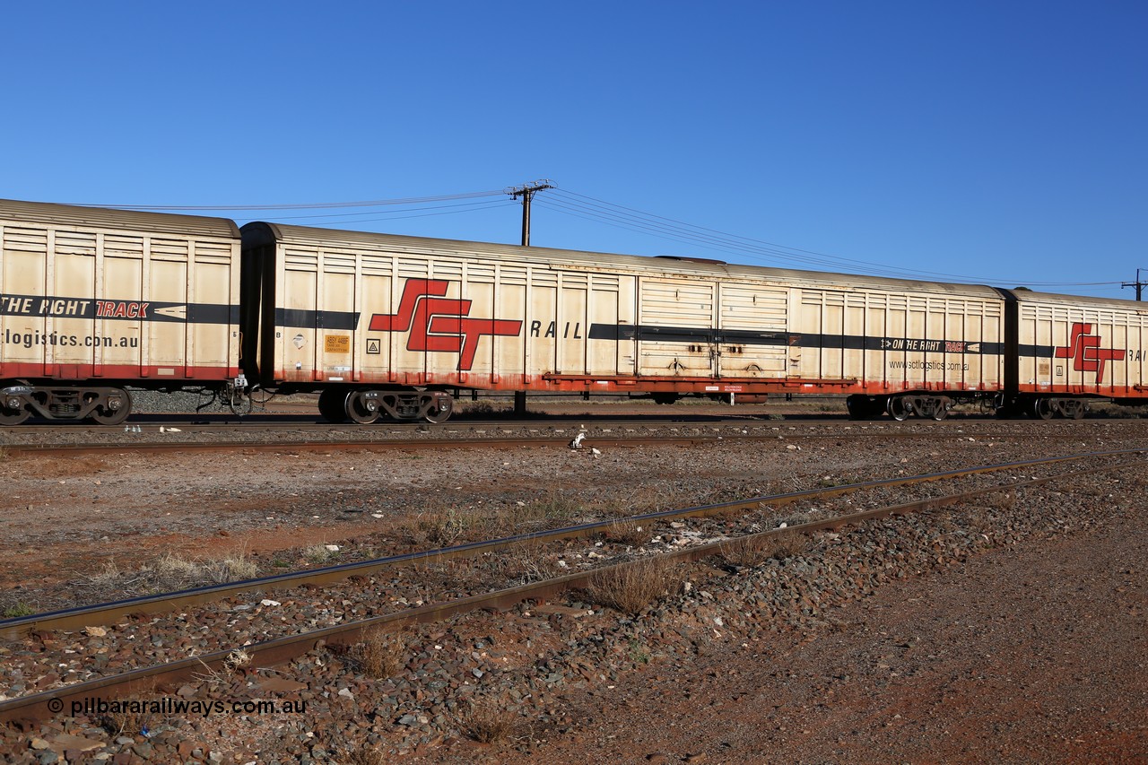 160530 9122
Parkeston, SCT train 1PM9 operates mostly empty from Perth to Melbourne, ABSY type covered van ABSY 4488, one of a batch of fifty made by Comeng WA as VFX type 75' covered vans 1977, recoded to ABFX type, when Gemco WA upgraded it to ABSY type, seen here with the silver corrugated roof fitted and the centre loading roof hatch.
Keywords: ABSY-type;ABSY4488;Comeng-WA;VFX-type;ABFX-type;