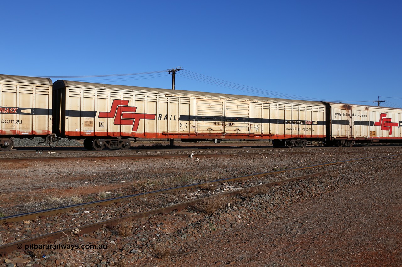 160530 9123
Parkeston, SCT train 1PM9 operates mostly empty from Perth to Melbourne, ABSY type covered van ABSY 4463, one of a batch of fifty made by Comeng WA as VFX type 75' covered vans 1977, recoded to ABFX then ABFY type, when Gemco WA upgraded it to ABSY type, seen here with the silver corrugated roof fitted.
Keywords: ABSY-type;ABSY4463;Comeng-WA;VFX-type;ABFX-type;