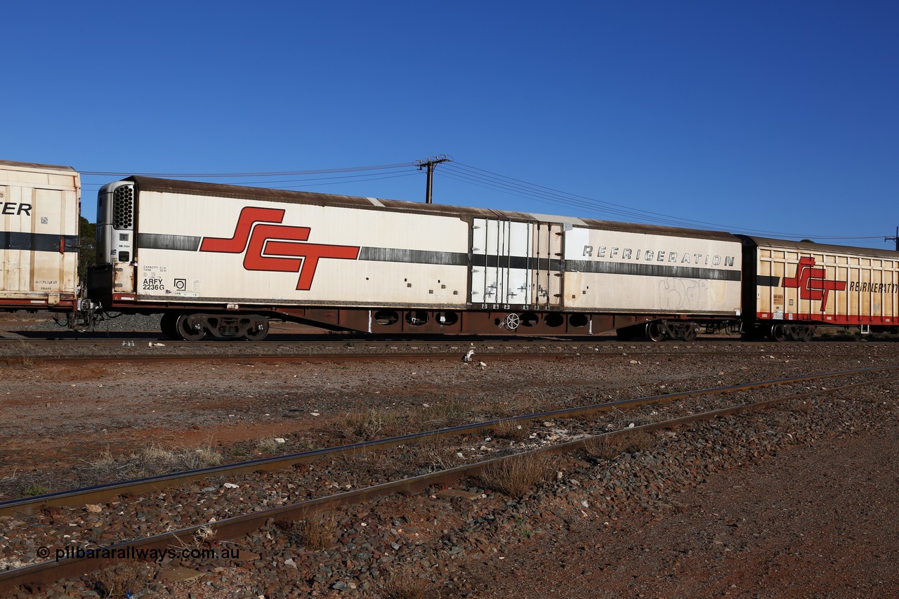 160530 9155
Parkeston, SCT train 1PM9 operates mostly empty from Perth to Melbourne, ARFY type ARFY 2236 refrigerated van with a New Zealand built Fairfax body mounted on an original Commonwealth Railways ROX container waggon built by Comeng Victoria in 1971, recoded to ROX, RQX, AFQX, AQOY and RQOY before having the Fairfax refrigerated body added circa 1998 for SCT service.
Keywords: ARFY-type;ARFY2236;Fairfax-NZL;Comeng-Vic;ROX-type;AQOX-type;