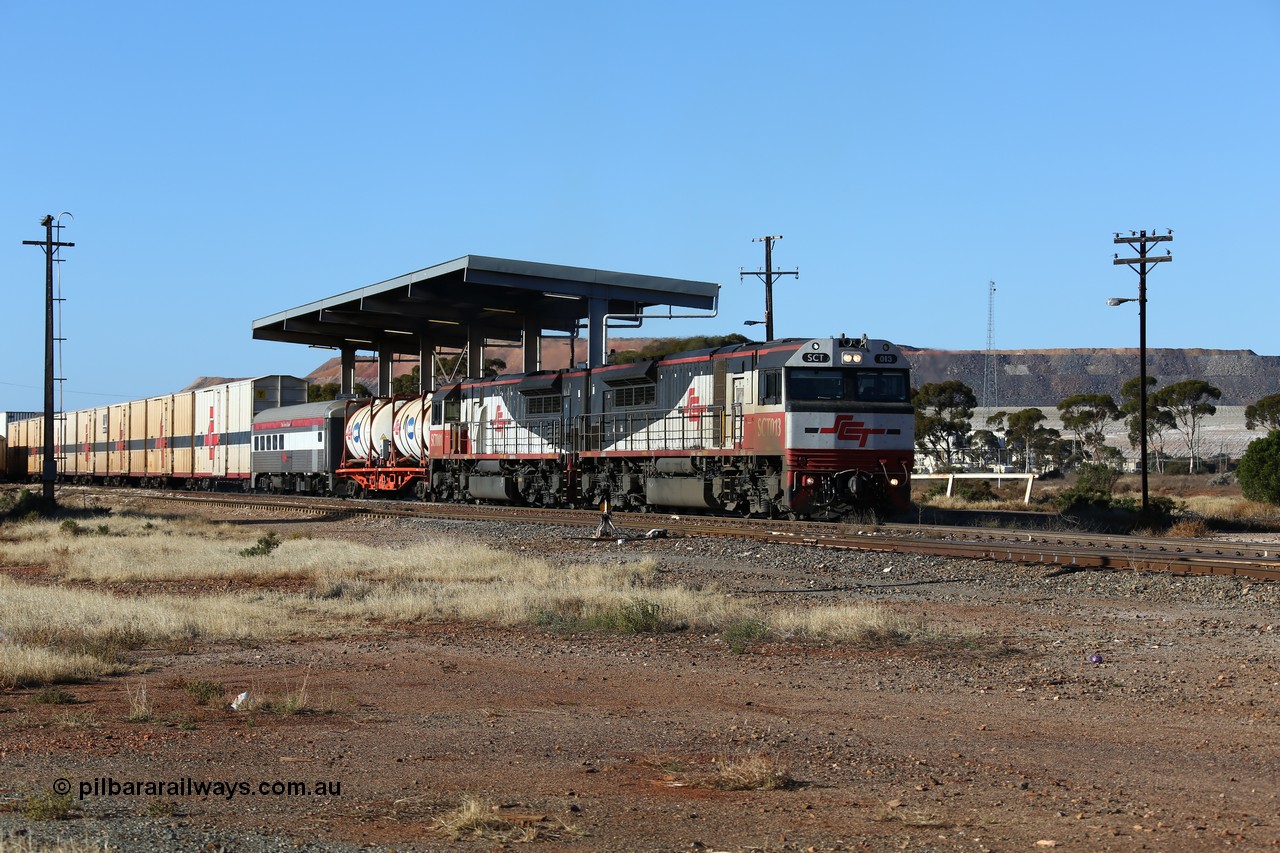 160530 9164
Parkeston, SCT train 7GP1 which operates from Parkes NSW (Goobang Junction) to Perth departs on the mainline behind SCT class SCT 013 serial 08-1737 an EDI Downer built EMD model GT46C-ACe and sister loco SCT 001 with 71 waggons for 5275 tonnes and 1679 metres.
Keywords: SCT-class;SCT013;EDI-Downer;EMD;GT46C-ACe;08-1737;