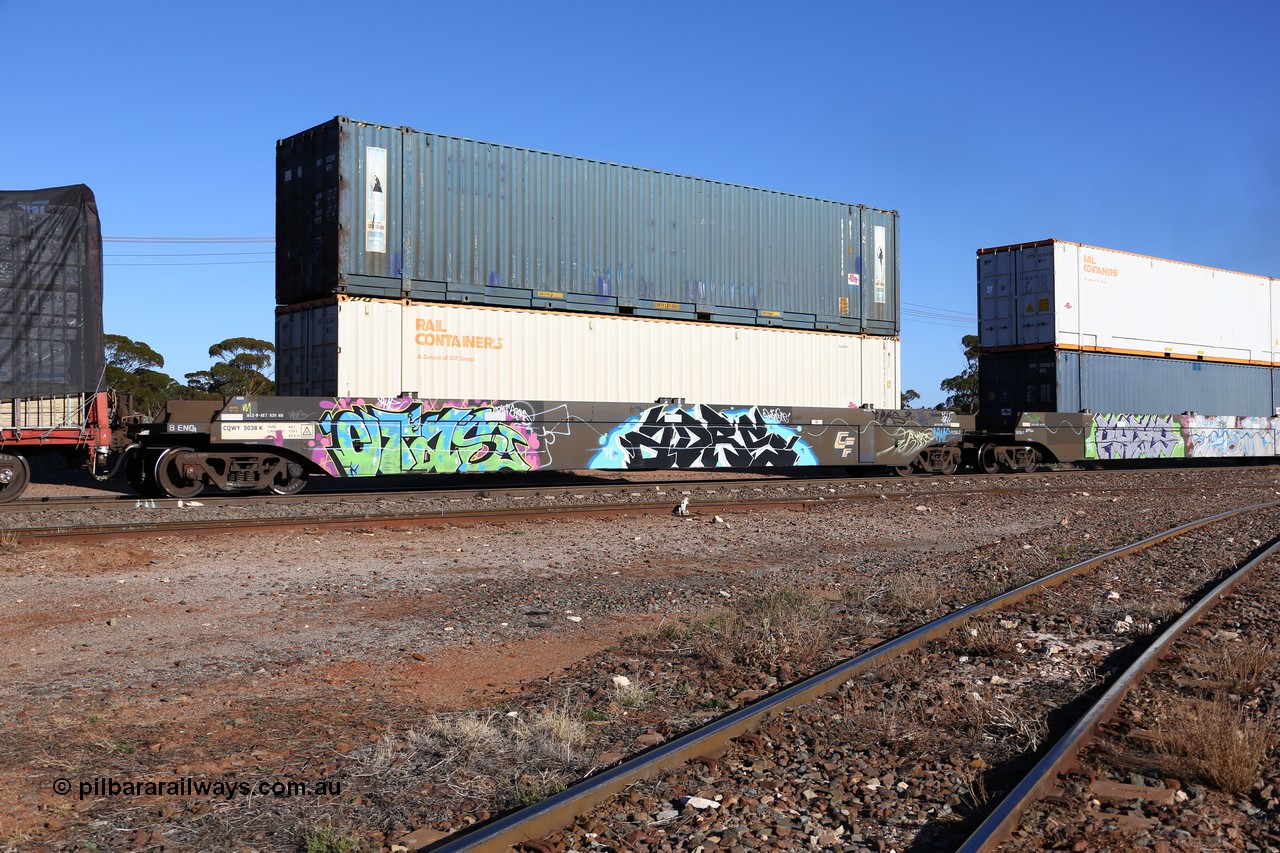 160530 9179
Parkeston, SCT train 7GP1 which operates from Parkes NSW (Goobang Junction) to Perth, CFCLA lease CQWY type well waggon set CQWY 5038-2 with two 48' MFG1 type boxes, Rail Containers SCFU 912607 and plain blue Royal Wolf RWTU 922046 both with SCT decals. The CQWY was built by Bluebird Rail Operations in South Australia in 2008 as a batch of sixty pairs.
Keywords: CQWY-type;CQWY5038;CFCLA;Bluebird-Rail-Operations-SA;