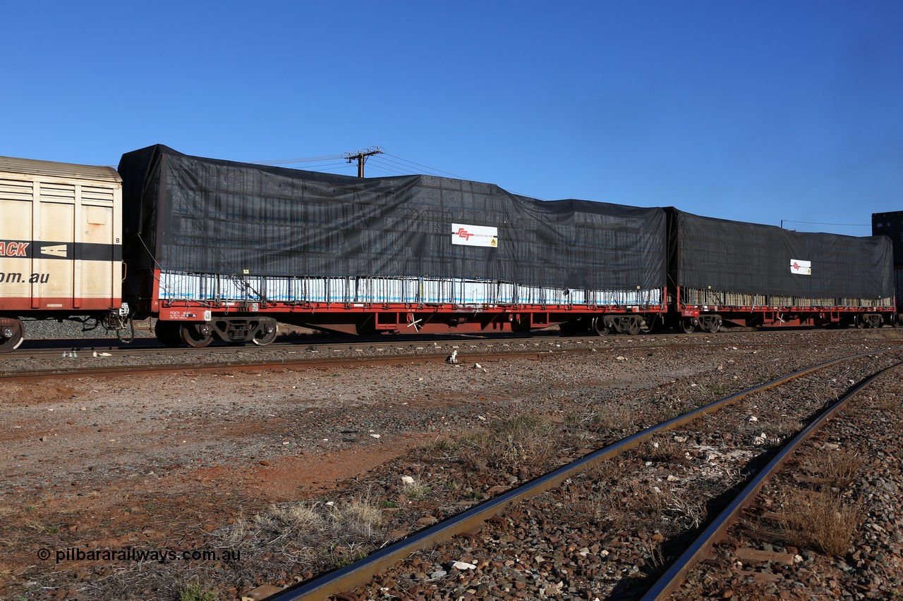 160530 9181
Parkeston, SCT train 7GP1 which operates from Parkes NSW (Goobang Junction) to Perth, PQCY 824 was originally built by Victorian Railways Newport Workshops in 1973 as one of one hundred and twenty five FQX type 60' 3TEU container flat waggons, it was recoded to VQCX before private ownership and reclassed PQCY type, PQCY 824 is now fitted with bulkheads and here loaded with timber products.
Keywords: PQCY-type;PQCY824;Victorian-Railways-Newport-WS;FQX-type;VQCX-type;