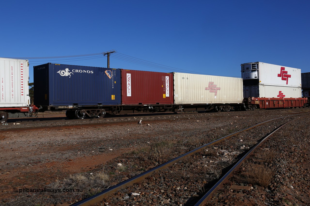 160530 9222
Parkeston, SCT train 7GP1 which operates from Parkes NSW (Goobang Junction) to Perth, originally built by Victorian Railways Newport Workshops in August 1975 as one of twenty five FCF type 'Jumbo' Container Flat waggons built, PQDY 6 still in Freight Australia green livery loaded with an SCT 40' reefer SCTR 128 and two 2EG1 type 20' boxes Grace GRRU 230218 and Cronos CXSU 115758.
Keywords: PQDY-type;PQDY6;Victorian-Railways-Newport-WS;FCF-type;FCW-type;VQDW-type;