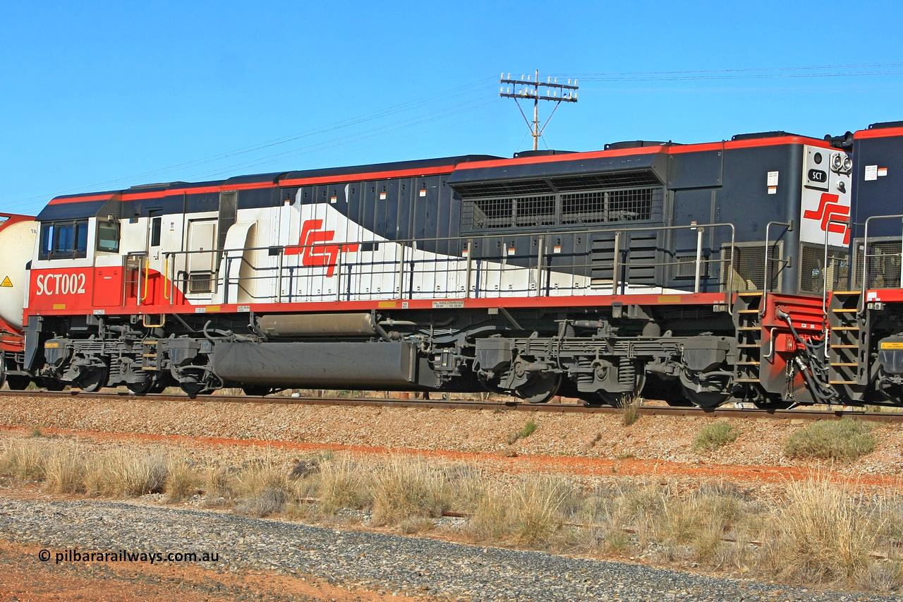 100603 8960
Parkeston, SCT's 3MP9 service operating from Melbourne to Perth with EDI Downer built EMD model GT46C-ACe unit SCT 002 as second unit with serial number 97-1726. Consist was74 waggons for 5674 tonnes and 1782.1 metres in length. 1336 hrs on the 3rd of June 2010.
Keywords: SCT-class;SCT002;07-1726;EDI-Downer;EMD;GT46C-ACe;