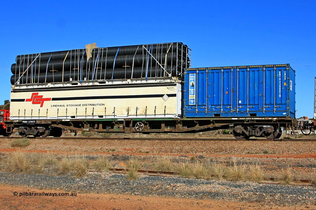 100603 8976
Parkeston, SCT train 3MP9, PQMY type container flat waggon PQMY 2782, built by Perry Engineering SA in 1974 as a batch of fifty five RMX type waggons, recoded through AQMX, AQSY and RQKY. Loaded with a Royal Wolf 20' 2NG8 type side door and a 40' flat rack MGCU 6609234 double stacked with an SCT 40' curtain sider SCT 1014.
Keywords: PQMY-type;PQMY2782;Perry-Engineering-SA;RMX-type;AQMX-type;AQMY-type;RQMY-type;