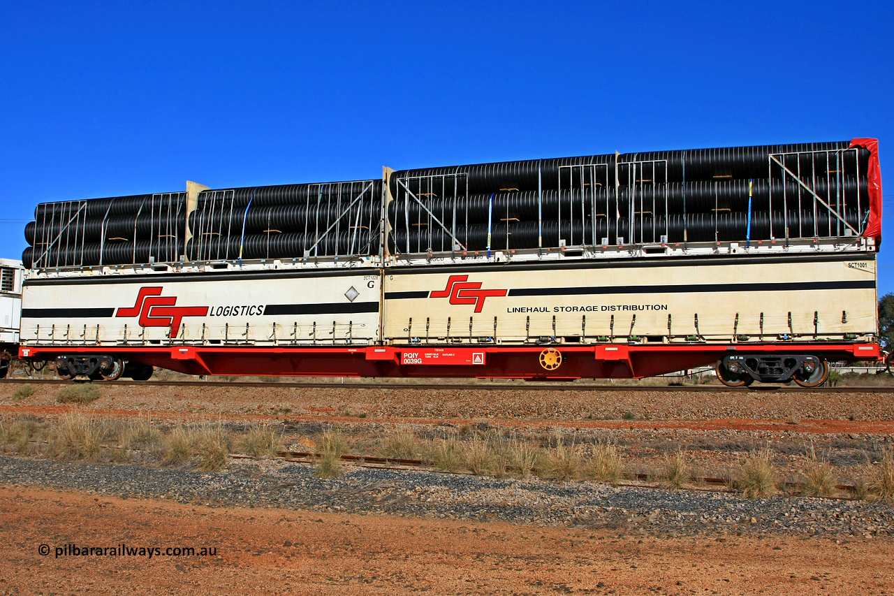 100603 8978
Parkeston, SCT train 3MP9, PQIY type 80' container flat PQIY 0039, one of forty units built by Gemco WA in 2009 loaded with a Macfield 40' flat rack MGCU 6609390 double stacked with an SCT 40' curtain sider SCT 1001 and a Macfield 40' flat rack MGCU 6609300 double stacked with another SCT 40' curtain sider SCT 1028.
Keywords: PQIY-type;PQIY0039;Gemco-WA;