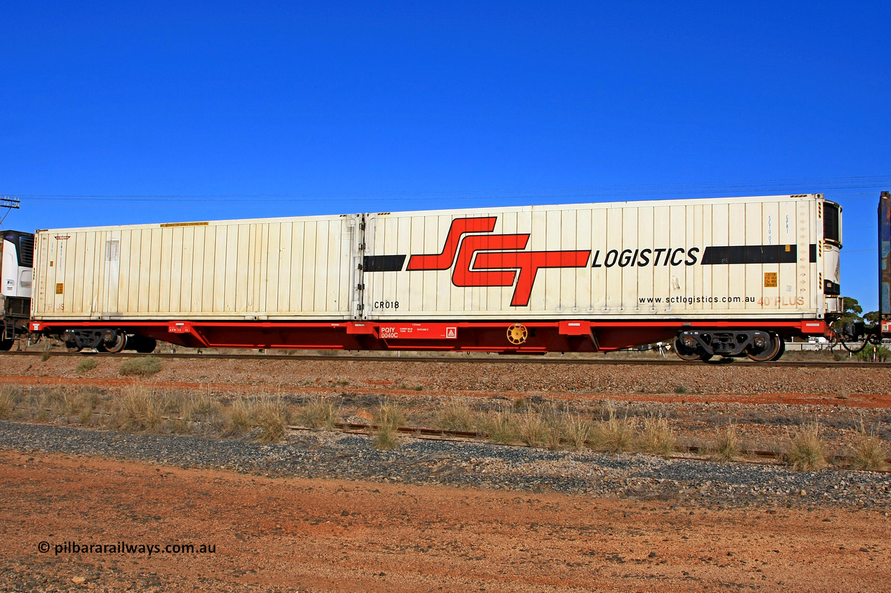 100603 9004
Parkeston, SCT train 3MP9, PQIY type 80' container flat PQIY 0040, final one of forty units built by Gemco WA in 2009 loaded with SCT Logistics 40' GPR1 type reefer SCTU 03 / CR018 and K+S Freighters 40' GPR1 type reefer RWRU 0003.
Keywords: PQIY-type;PQIY0040;Gemco-WA;