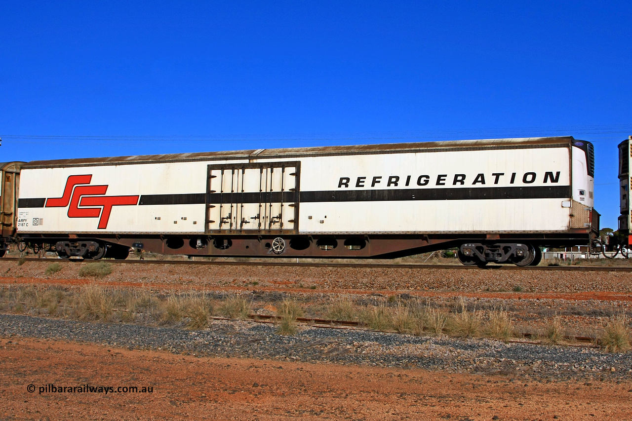 100603 9005
Parkeston, SCT train 3MP9, ARFY type ARFY 2187 refrigerated van with the original style short side doors Fairfax (NZL) built fibreglass body that has been fitted to a Comeng Qld 1970 built RO type flat waggon that was in service with Commonwealth Railways and recoded though ROX - AQOX - AQOY - RQOY codes before conversion.
Keywords: ARFY-type;ARFY2187;Fairfax-NZL;Comeng-Qld;RO-type;AQOX-type;