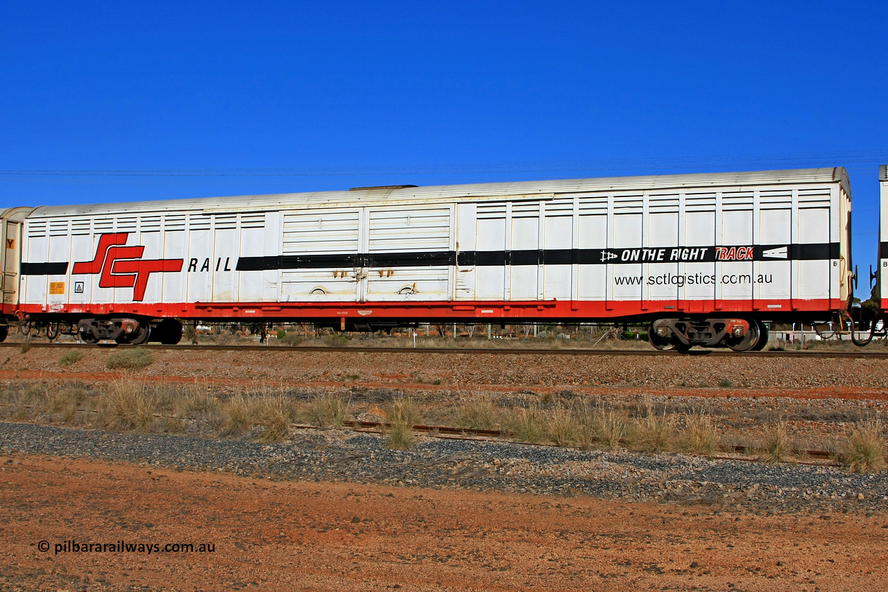 100603 9025
Parkeston, SCT train 3MP9, ABSY type covered van ABSY 2683, one of a batch of fifty made by Comeng WA as VFX type 75' covered vans in 1977, recoded to ABFX then ABFY type, to SCT then Gemco WA upgraded it to ABSY type in 2004/05, seen here with the silver corrugated roof fitted.
Keywords: ABSY-type;ABSY2683;Comeng-NSW;VFX-type;ABFX-type;ABFY-type;