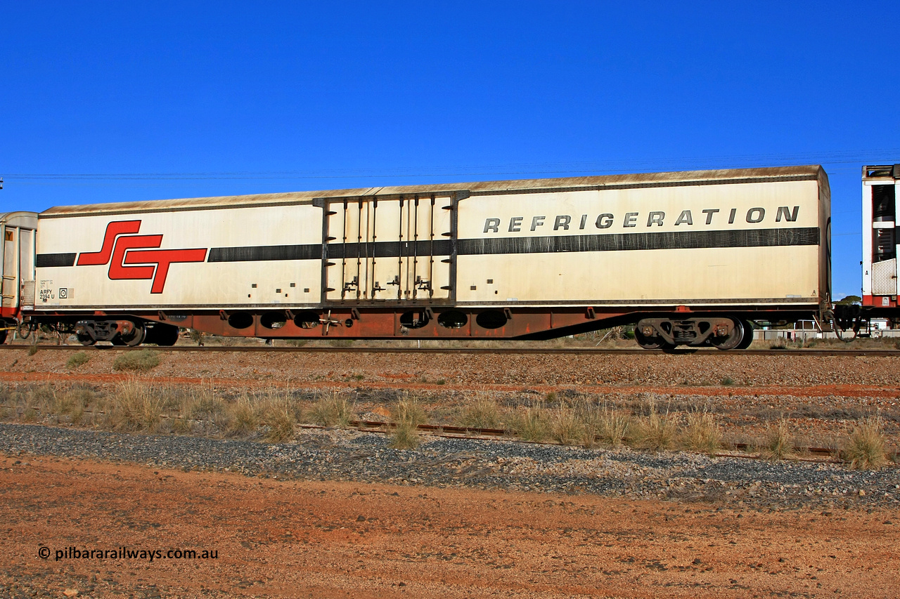 100603 9030
Parkeston, SCT train 3MP9, ARFY type ARFY 2394 refrigerated van with the original style short side doors Fairfax (NZL) built fibreglass body that has been fitted to a Perry Engineering SA 1971 built ROX type flat waggon that was in service with Commonwealth Railways and recoded though RQX - AFQX - AQOY - RQOY codes before conversion.
Keywords: ARFY-type;ARFY2394;Fairfax-NZL;Perry-Engineering-SA;ROX-type;RQX-type;AFQX-type;AQOY-type;RQOY-type;