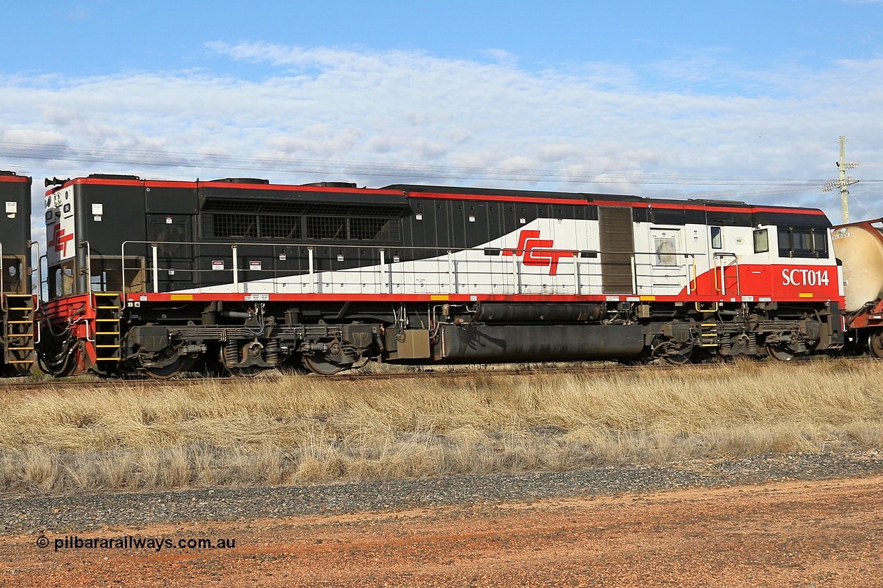 130710 1006
Parkeston, SCT train 3PG1 which operates from Perth to Parkes [Goobang Junction, NSW], with second unit SCT class SCT 014 an EDI Downer built EMD model GT46C-ACe unit with serial number 08-1738. Wednesday 10th of July 2013.
Keywords: SCT-class;SCT014;EDI-Downer;EMD;GT46C-ACe;07-1738;