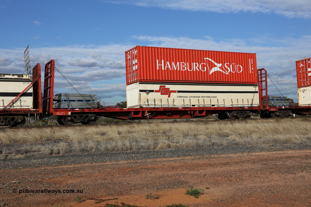 130710 1010
Parkeston, SCT train 3PG1 operating from Perth to Melbourne, PQCY 824 was originally built by Victorian Railways Newport Workshops in 1973 as one of four hundred and twenty five FQX type 60' 3TEU container flat waggons, it was recoded to VQCX before private ownership and reclassed PQCY type. PQCY 824 is now fitted with bulkheads and here loaded its own gates, and an SCT half height curtain sider 40' container SCT 1004 double stacked with Hamburg Sud 40' 45G1 type container HASU 411182.
Keywords: PQCY-type;PQCY824;Victorian-Railways-Newport-WS;FQX-type;VQCX-type;