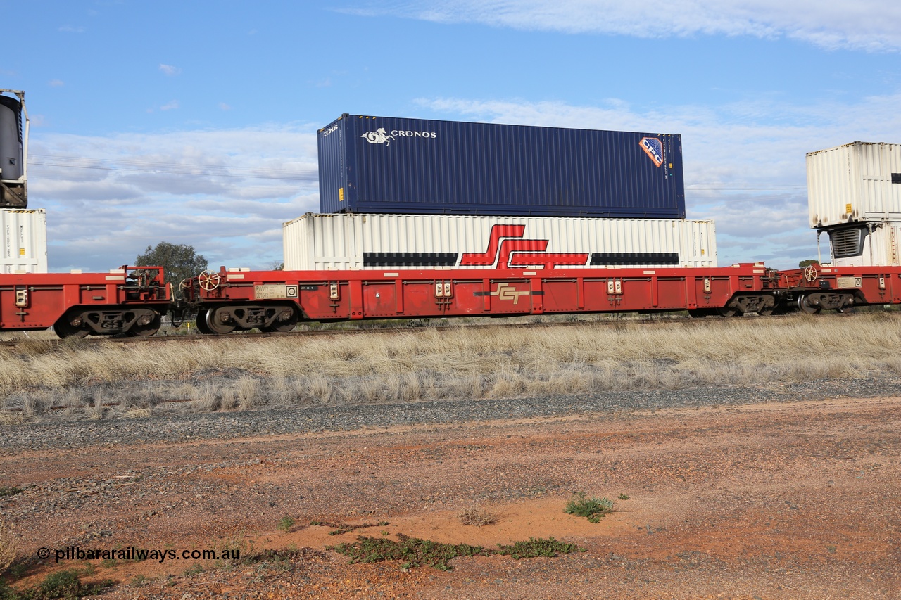 130710 1021
Parkeston, SCT train 3PG1, PWWY type 100 tonne well waggon PWWY 0016 double stacked with an SCT 48' MFG1 type container SCTDS 4807 and a 40' Cronos 4EG1 type container CXSU 103657. Bradken NSW built forty of these PWWY wells for SCT in 2008.
Keywords: PWWY-type;PWWY0016;Bradken-NSW;