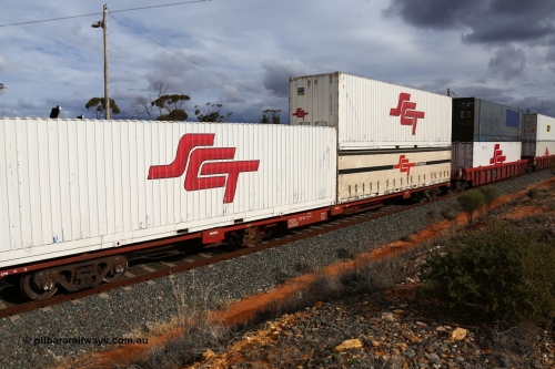 160526 5328
West Kalgoorlie, SCT train 3MP9 operating from Melbourne to Perth, Gemco WA built forty of these PQIY type 80' container flat waggons in 2009, PQIY 0036 loaded with two SCT 40' boxes SCT 40213 and SCT 40214 on top of a 40' half height curtainsider SCT 1035.
Keywords: PQIY-type;PQIY0036;Gemco-WA;