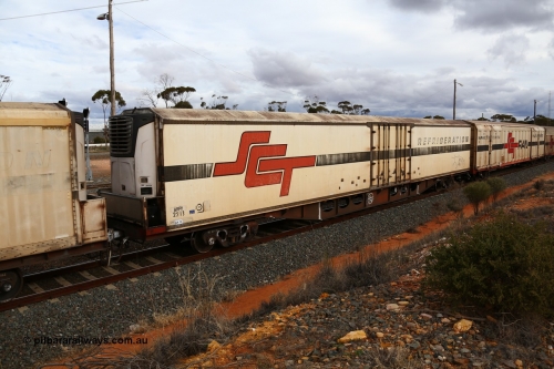 160526 5354
West Kalgoorlie, SCT train 3MP9 operating from Melbourne to Perth, ARFY type ARFY 2213 refrigerated van with the later style full height side doors Fairfax (NZL) built fibreglass body that has been fitted to a Comeng Victoria 1971 built RO type flat waggon that was in service with Commonwealth Railways and recoded though ROX - AQOX - AQOY - RQOY codes before conversion.
Keywords: ARFY-type;ARFY2213;Fairfax-NZL;Comeng-Vic;RO-type;AQOX-type;