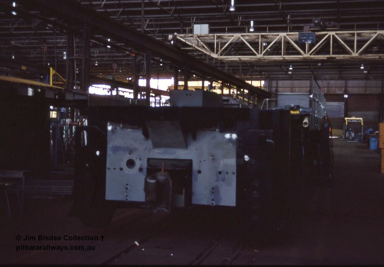 1050 001
Welshpool, Goninan Open Day 27th August, 1988. Brand new GE CM39-8 locomotive 5633 serial 5831-12 / 88-082 is only in the early stages of construction for Mt Newman Mining.
Jim Bisdee photo.
Keywords: 5633;Goninan;GE;CM39-8;5831-12/88-082;