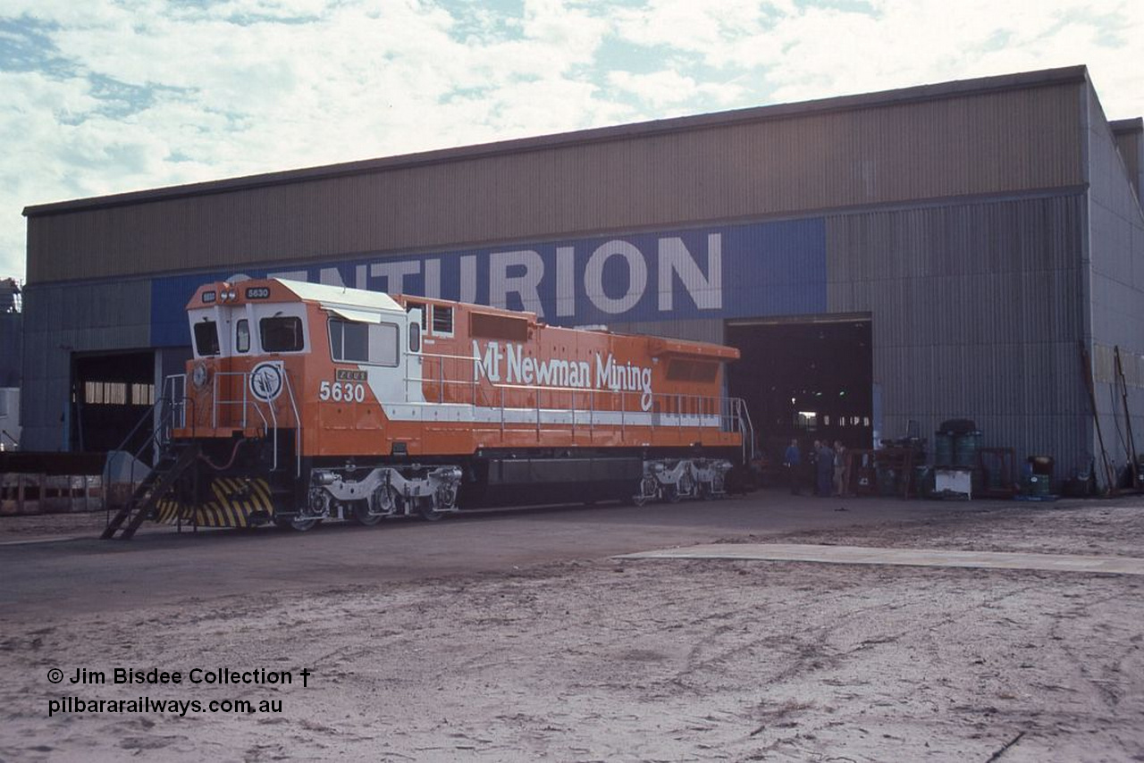 1051 001
Welshpool, Goninan Open Day 27th August, 1988. Mt Newman Mining's Goninan new build GE CM39-8 model loco 5630 'Zeus' serial 5831-09 / 88-079 out the front of the workshop on display.
Jim Bisdee photo.
Keywords: 5630;Goninan;GE;CM39-8;5831-09/88-079;